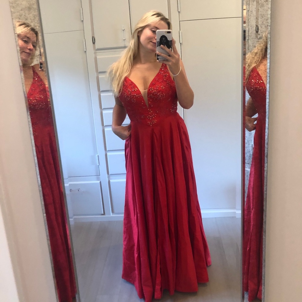 Red sequined ball gown dress